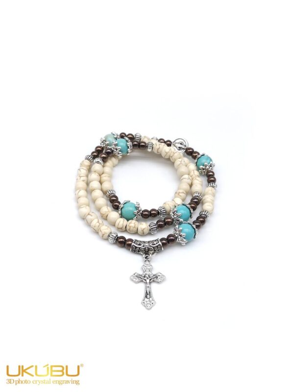 PTER6ML36 6343feb4c2dced2e5e5bb500 - Bracciale rosario elasticizzato con grani in pietra howlite beige 6mm con Madonna Miracolosa
